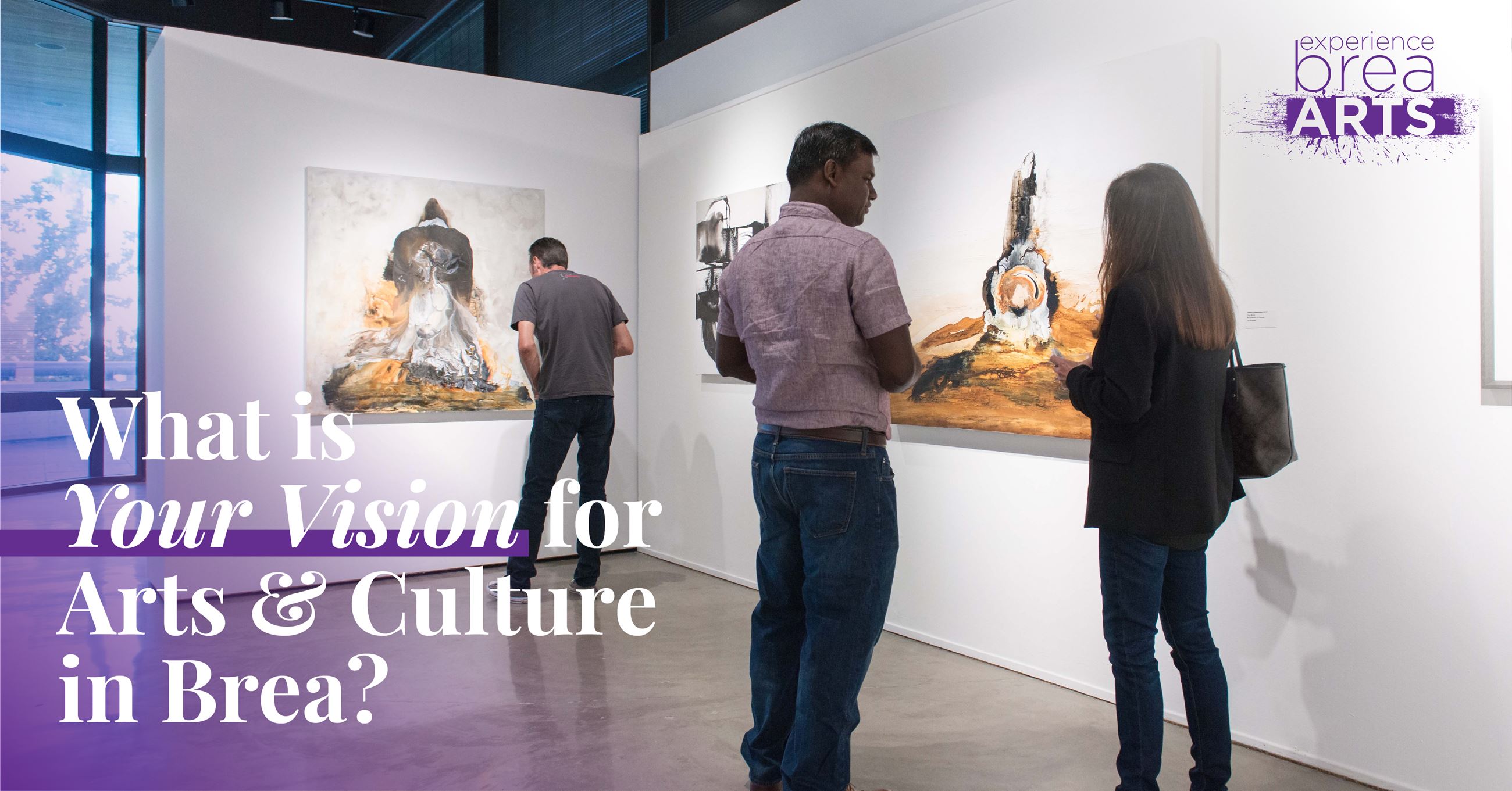 Patrons enjoying art at the Brea Gallery